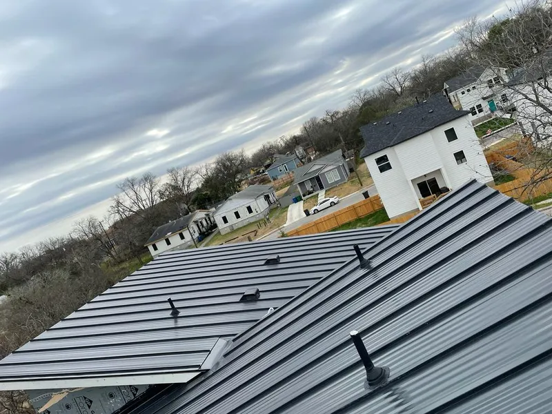 Standing seam metal roof panels with vents for Skylight Repair in Easton